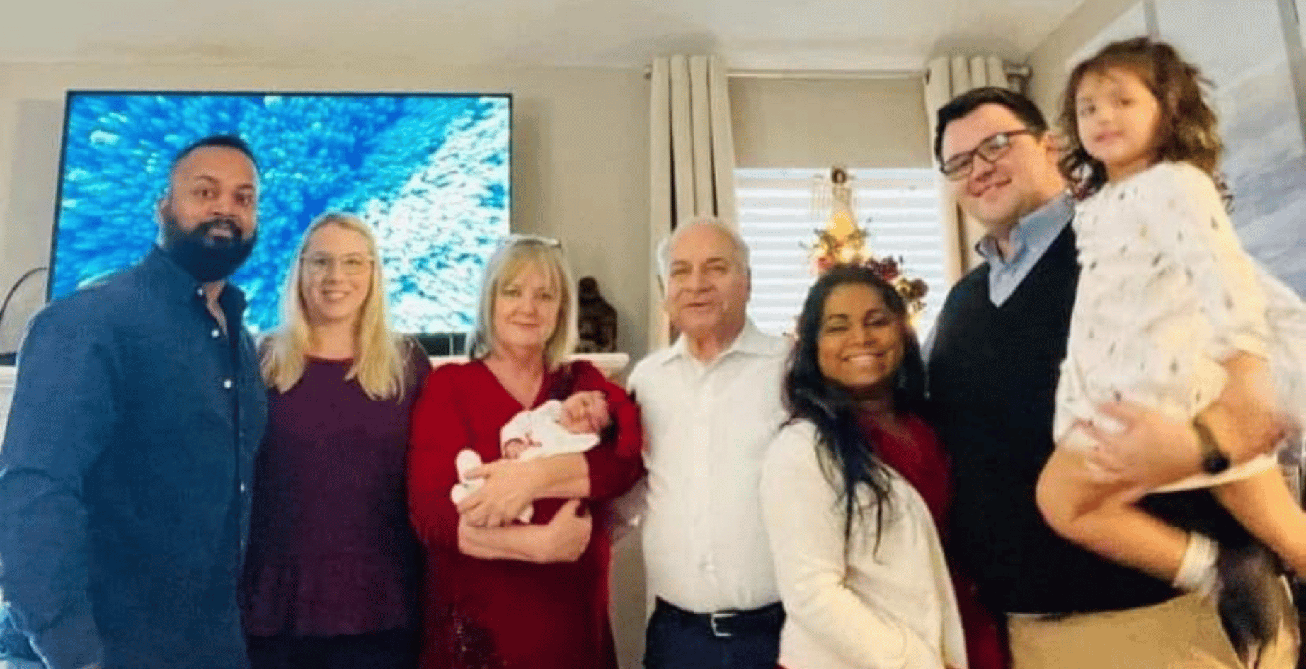 Lisa Anderson surrounded by family, showing how adoption can grow a family across generations.